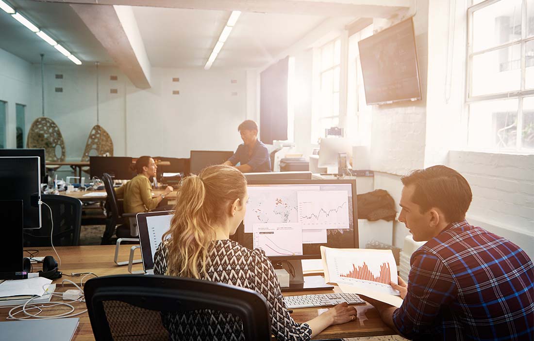 Young business professionals working in an office.