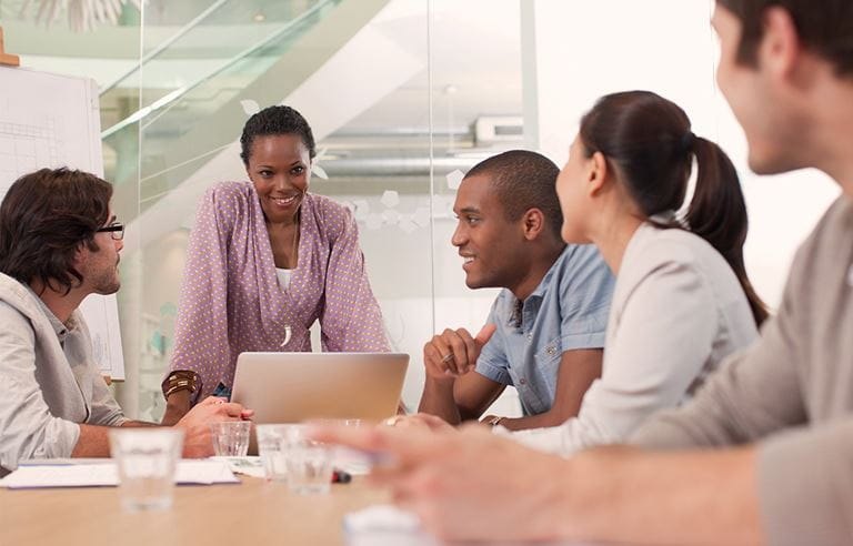 Image of a woman leading a meeting