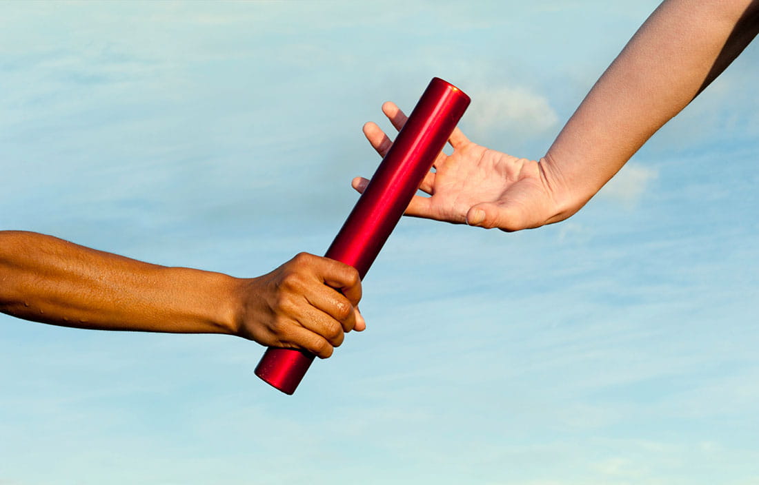 People passing a baton