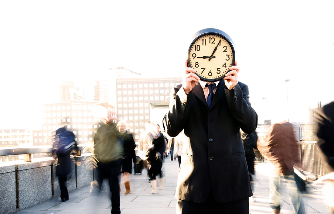 Images of man with clock in front of his face