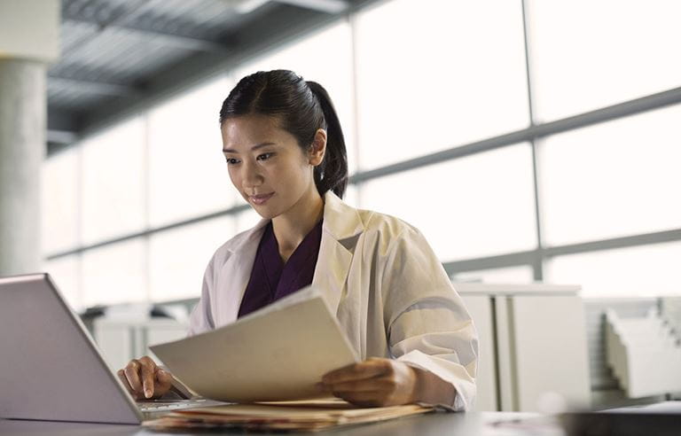 Women looking at files