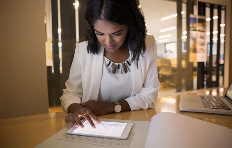 Image of woman working on tablet