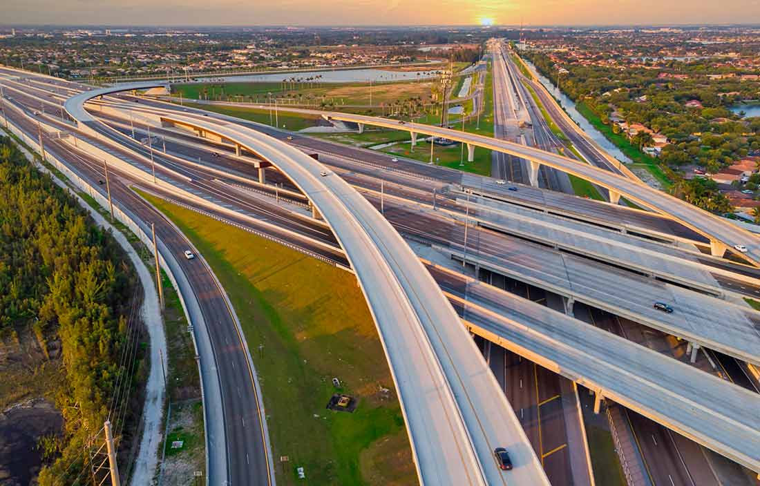 Aerial view of interstate highway without traffic.