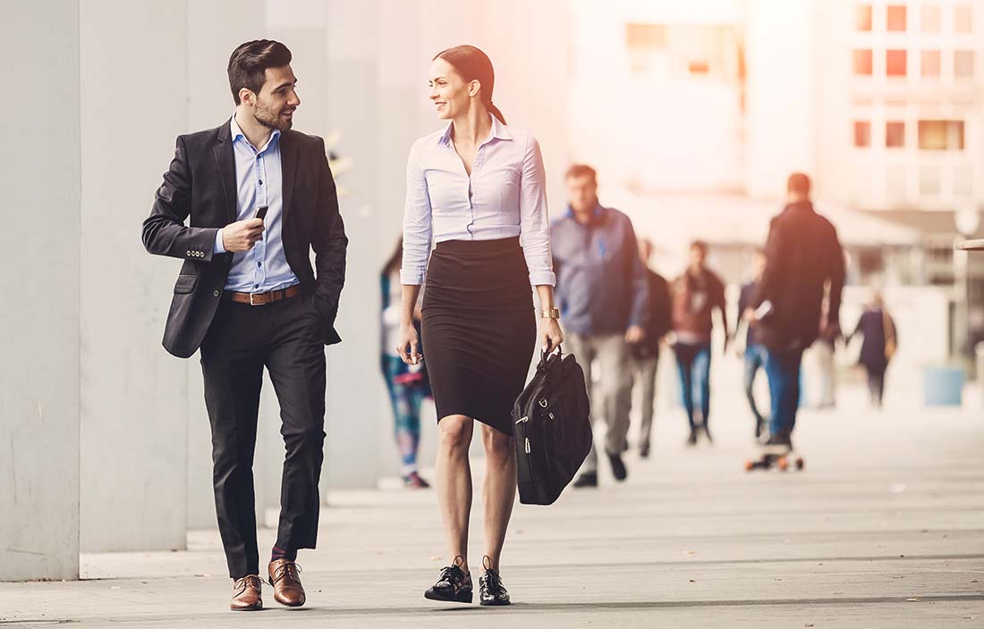 Man and women walking