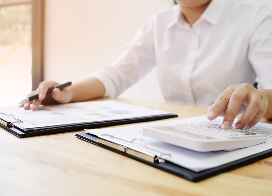 Man sitting at desk with notebook