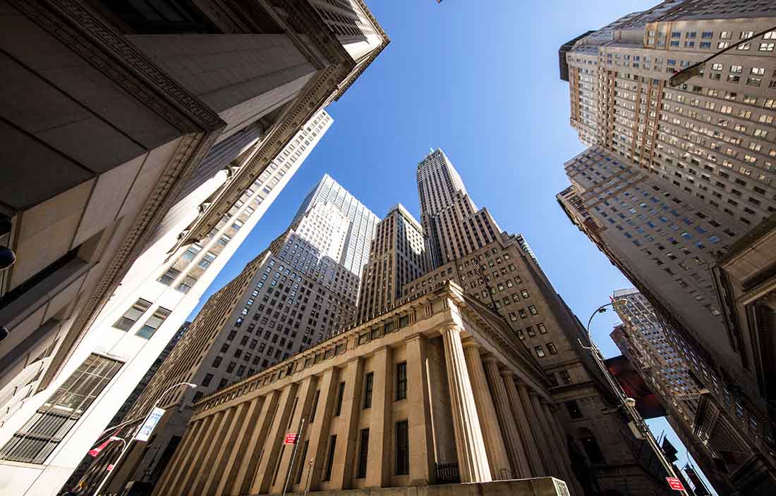 View of tall buildings from the ground.