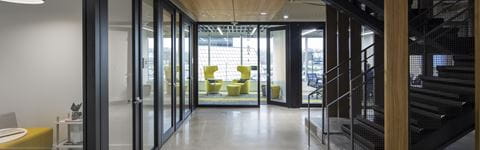 Hallway and staircase of Plante Moran Southfield office.