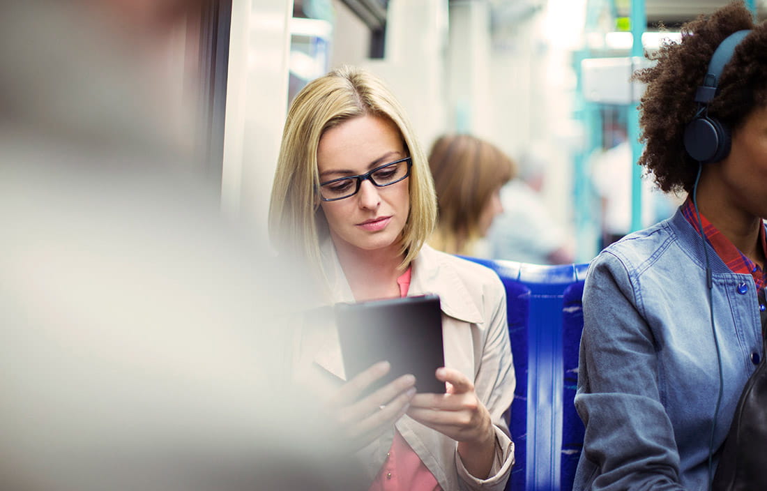 Woman reading Goverment alert