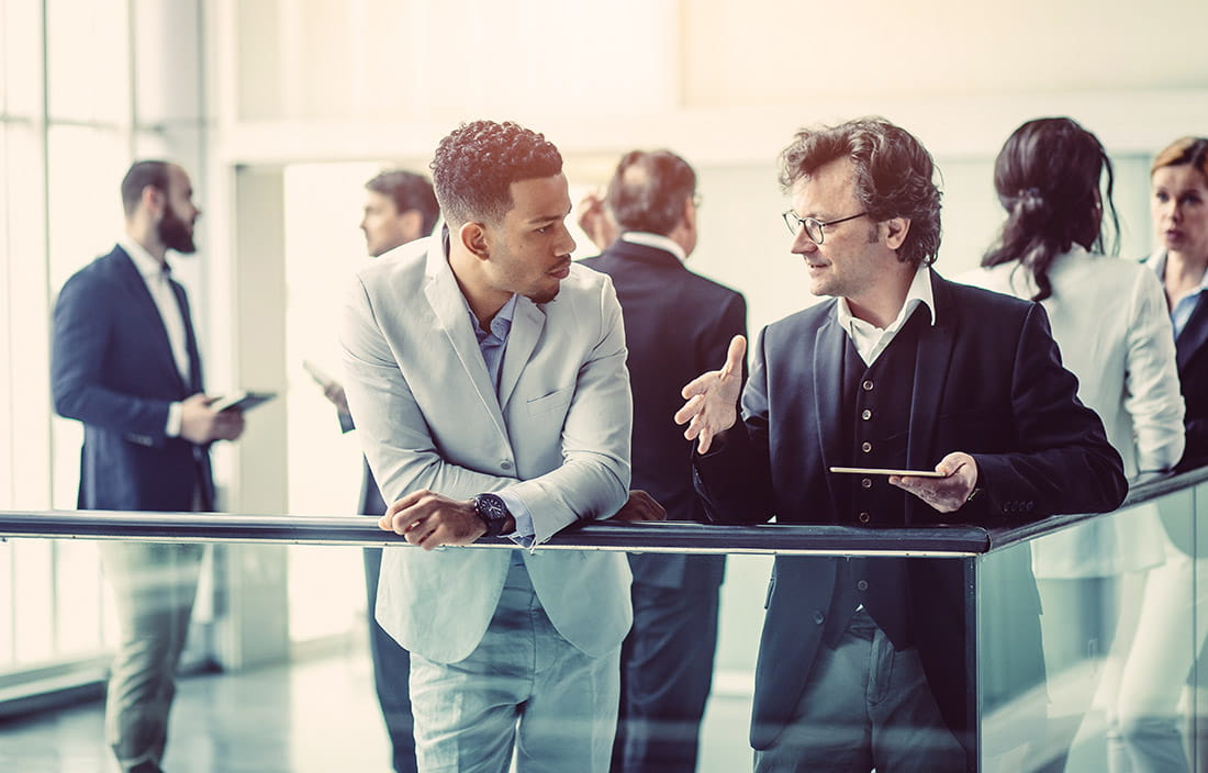 Two nonprofit staff discussing ideas