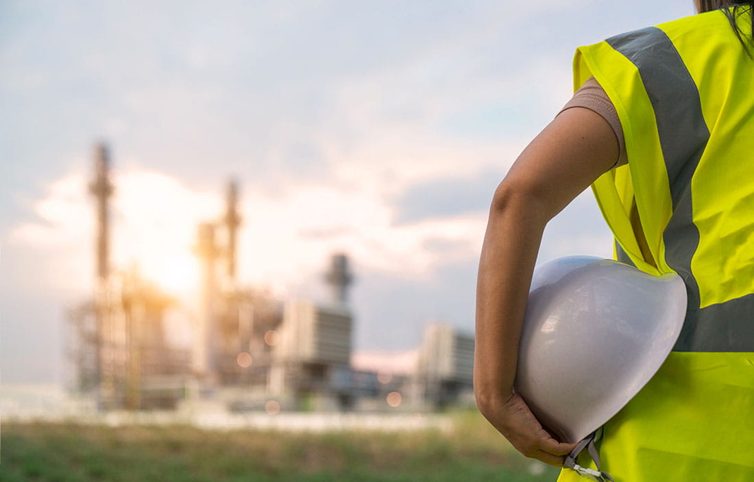 Construction worker looking at a construction site