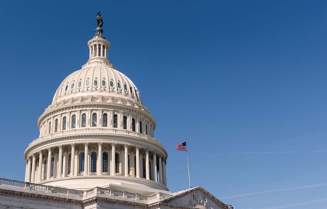 Close up shot of the United States capitol building during the day. 