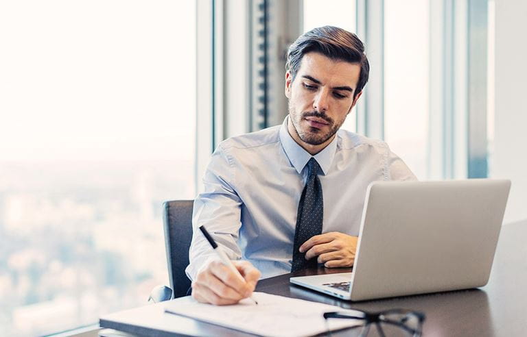 Professional alone at computer