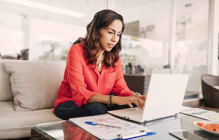 Business professional working from home using their laptop computer.