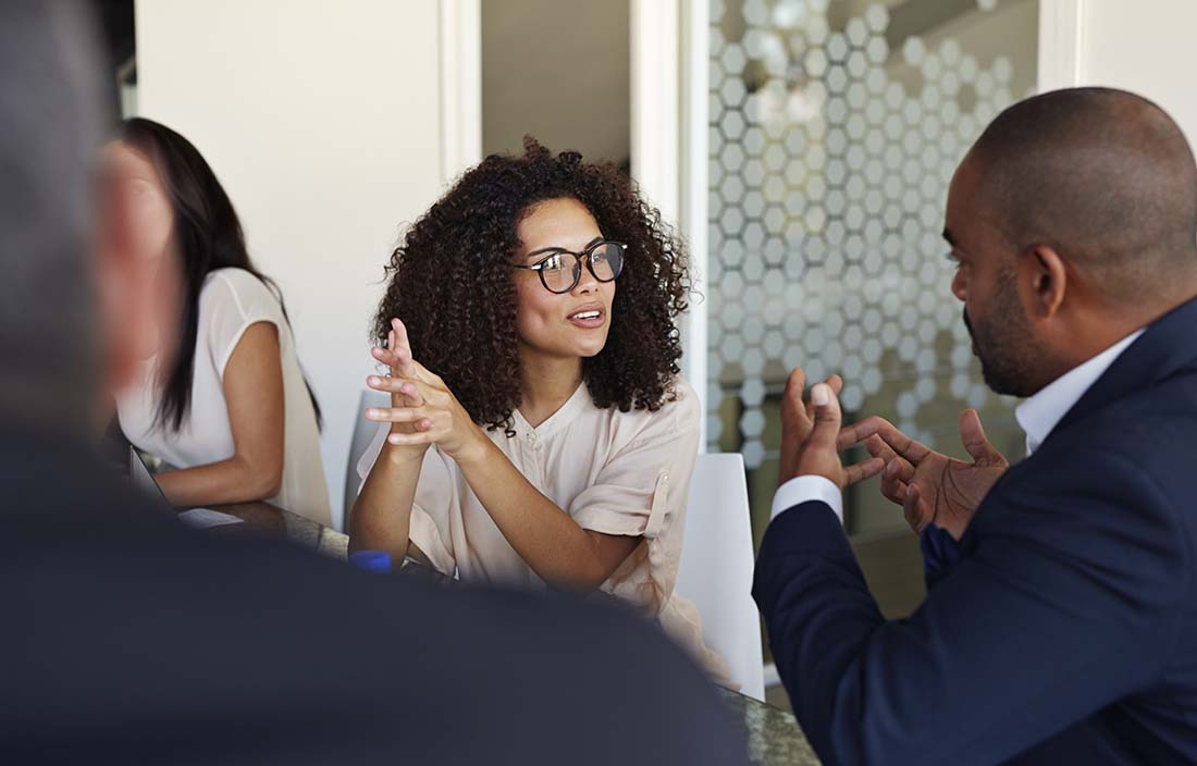 Two business professionals having a discussion.