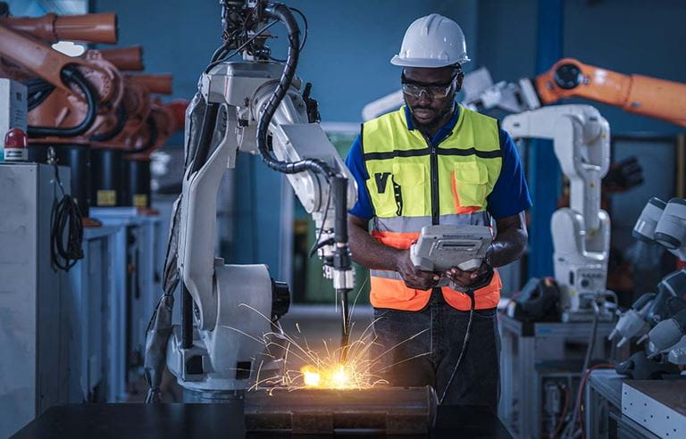 Manufacturer inspecting equipment for compliance.