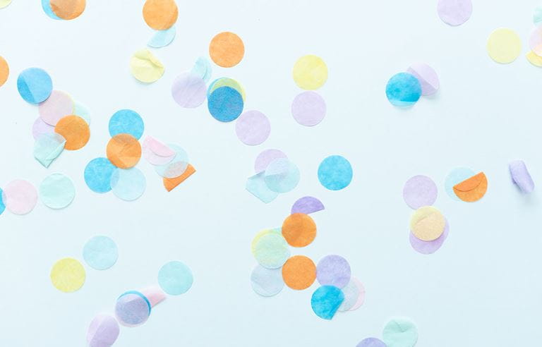 Confetti against a white background.