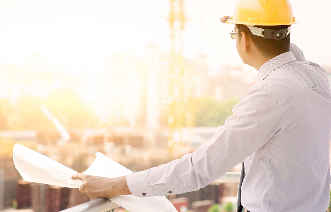 Owner's representative overseeing a sunny senior living construction site